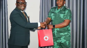 ZRCS secretary General Mr. Cosmass Sakala with ZCS Deputy Commissioner General  Bwalya Kuyomba